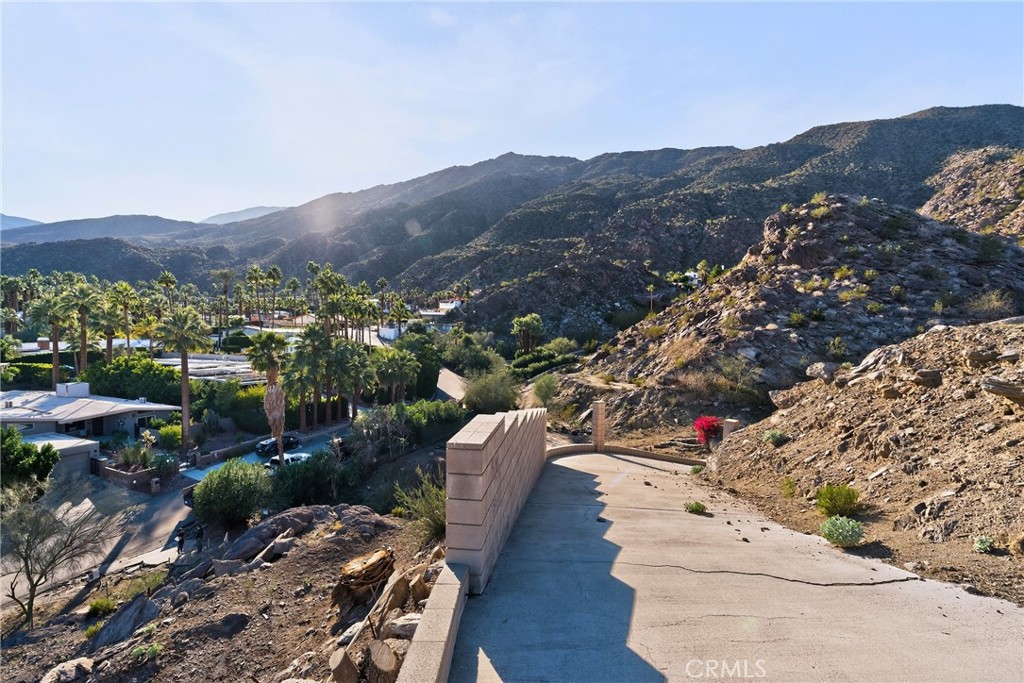 1 Ridge Road Palm Springs, CA 92264 - Photo 9 of 60 a view of city from terrace with outdoor seating