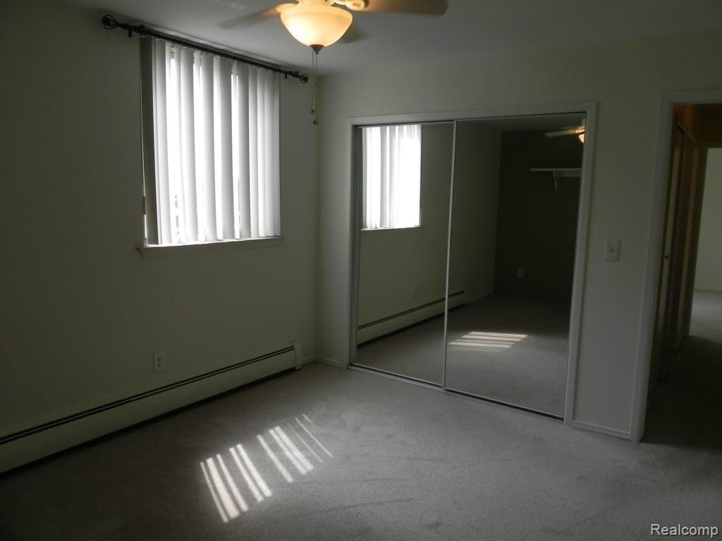 4905 Crooks Road, Unit 66 Royal Oak, MI 48073 - Photo 12 of 19 Master bedroom is large and has a double closet