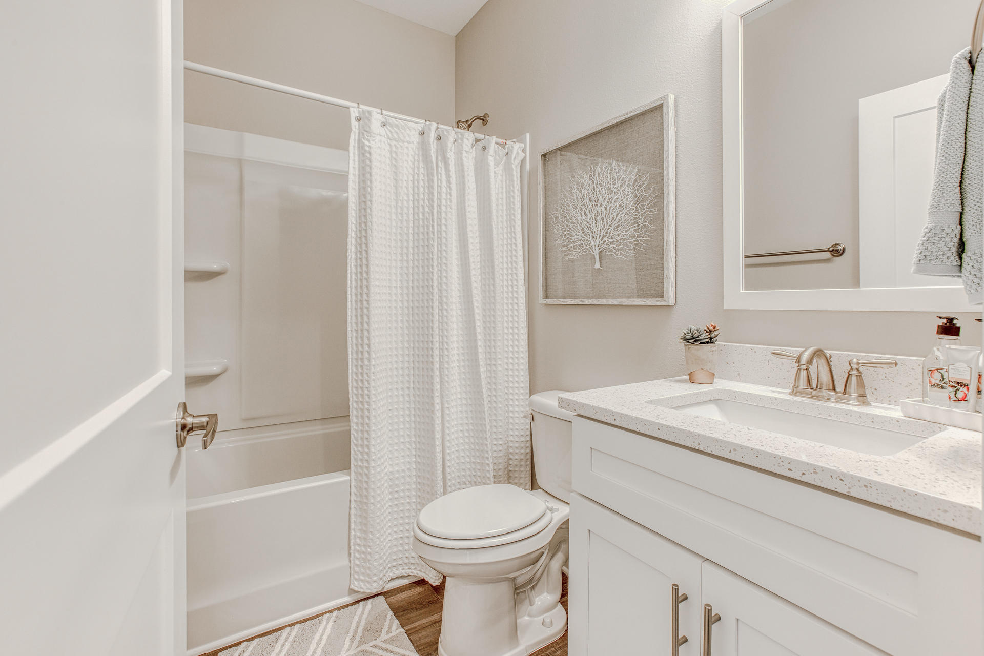 306 North Sand Palm Road, Unit 151VISTA Freeport, FL 32439 - Photo 14 of 24 a bathroom with a sink a toilet and shower