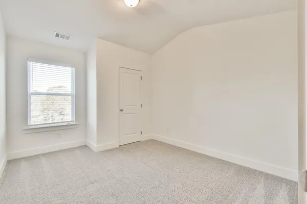 a bathroom with a sink toilet a mirror and shower