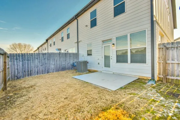 a view of a swimming pool with an outdoor space