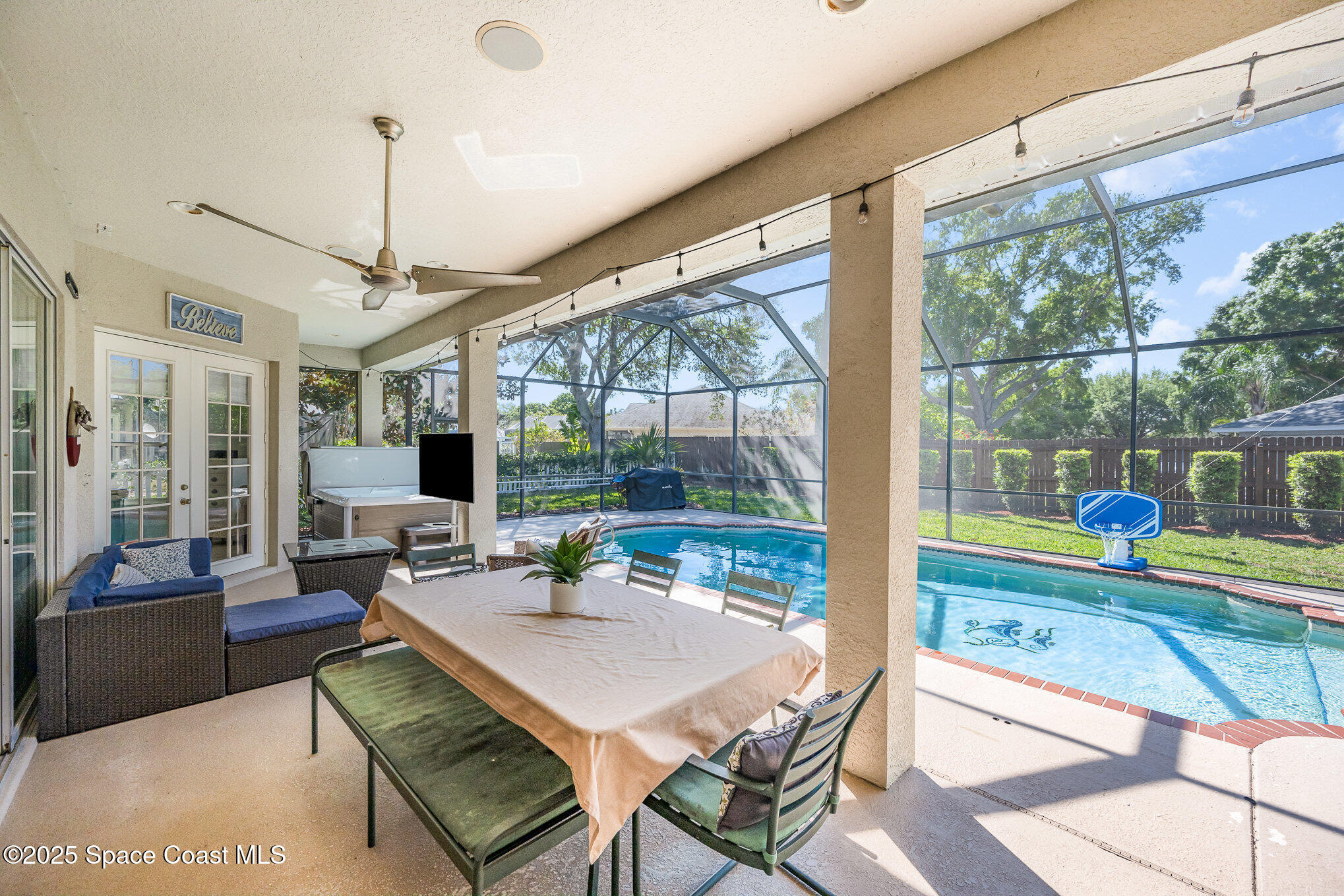 920 Maple Ridge Drive Merritt Island, FL 32952 - Photo 11 of 40 Scrn Lanai with hot tub