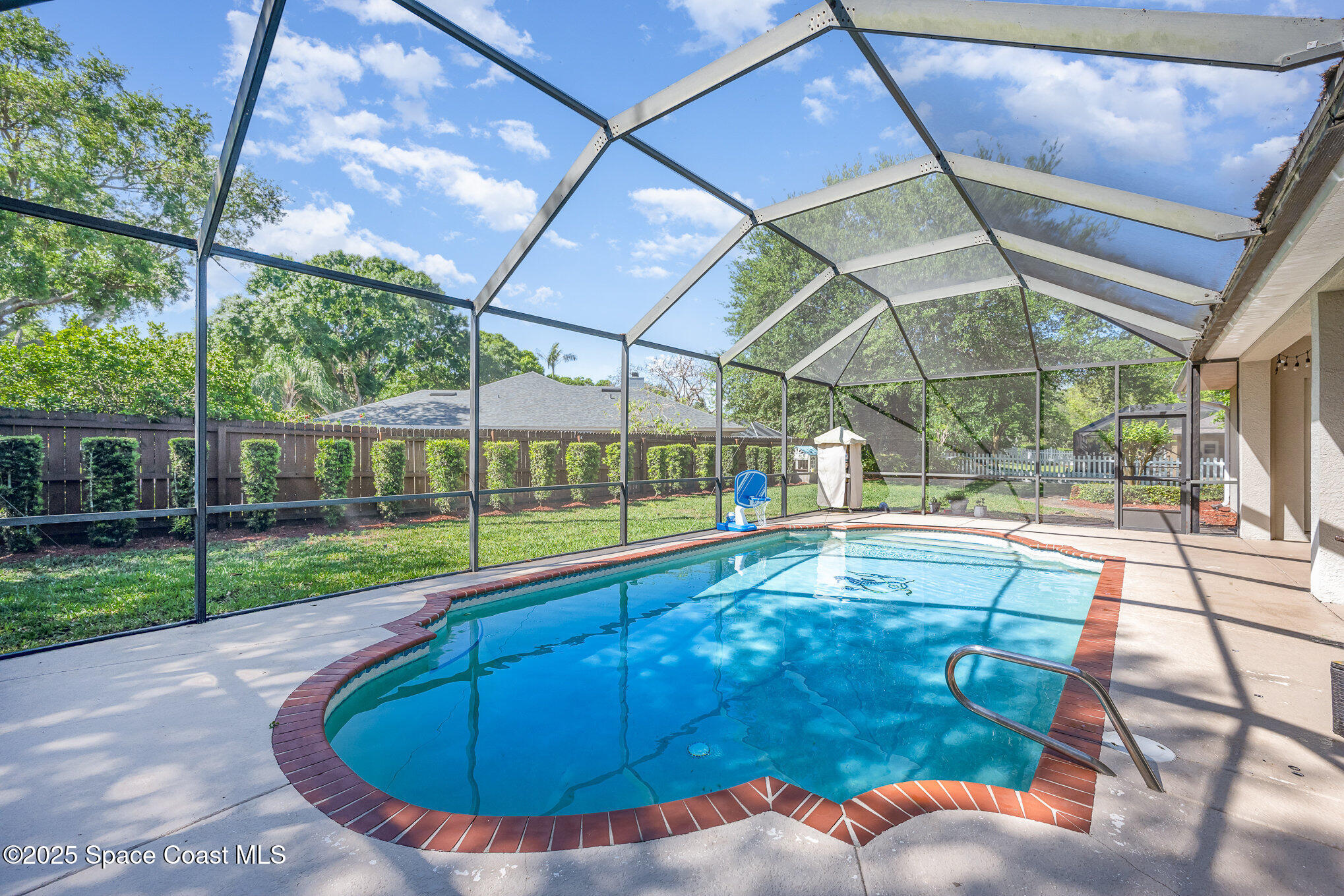 920 Maple Ridge Drive Merritt Island, FL 32952 - Photo 5 of 40 Screened Lanai with Spa