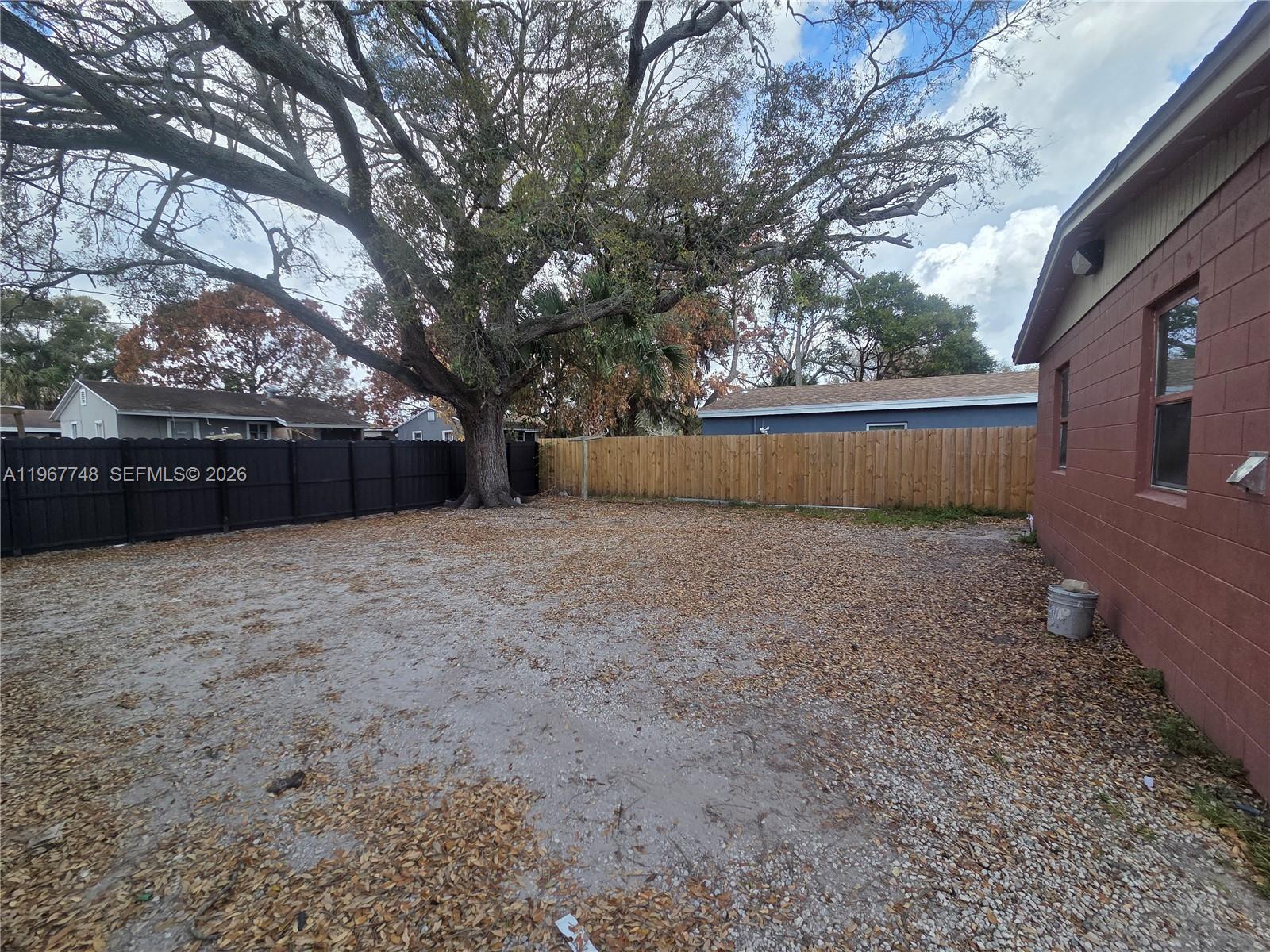 503 North 25th Street, Unit 2 Fort Pierce, FL 34947 - Photo 15 of 19 a view of backyard with green space