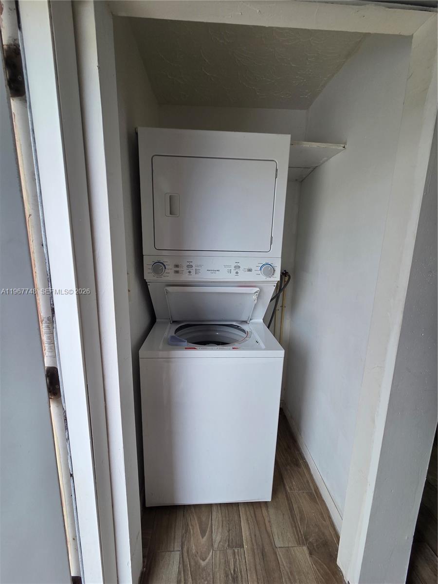 503 North 25th Street, Unit 2 Fort Pierce, FL 34947 - Photo 4 of 19 a utility room with a washer and dryer