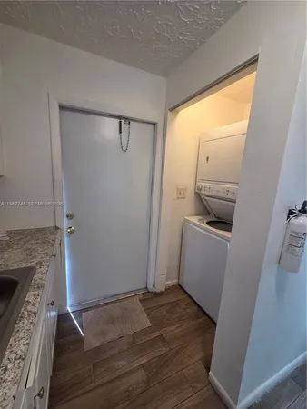 a view of a storage & utility room with washer and dryer