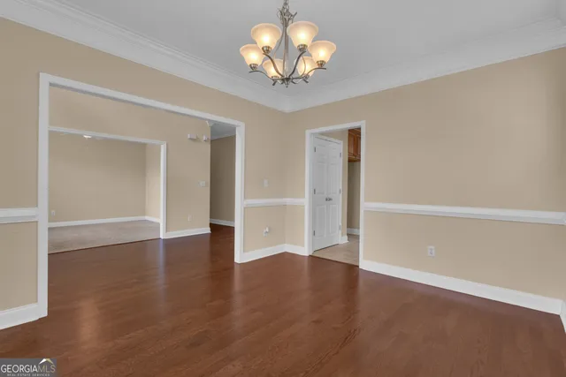 a view of storage and utility room with a window