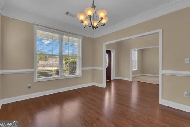 a kitchen with stainless steel appliances granite countertop a sink stove and microwave