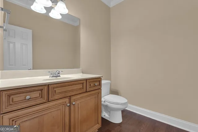 a spacious bathroom with a granite countertop sink a mirror and a