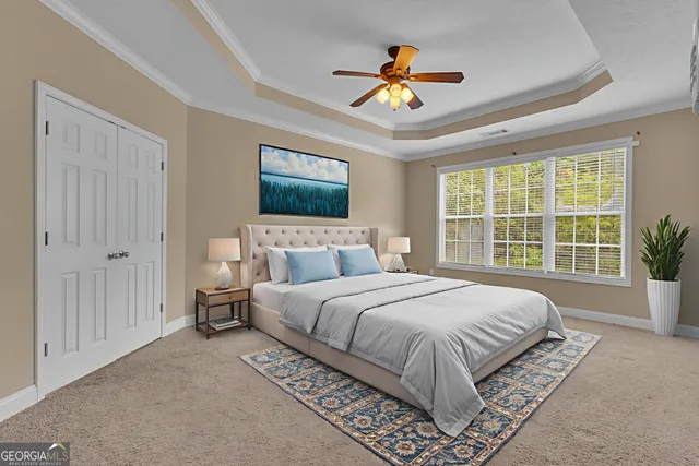 a spacious bathroom with a granite countertop sink and a mirror