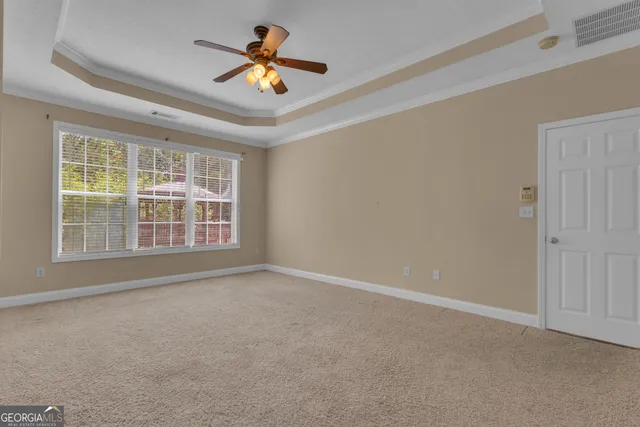 a view of a window in an empty room