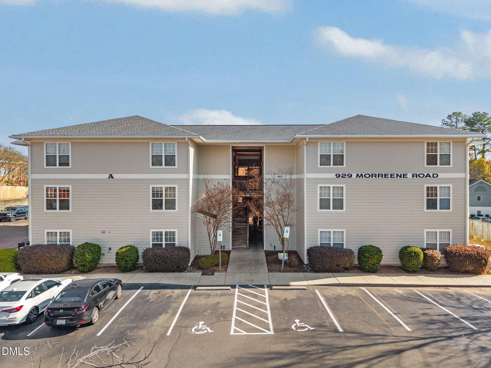 929 Morreene Road, Unit A23 Durham, NC 27705 - Photo 1 of 50 a front view of a house with a patio