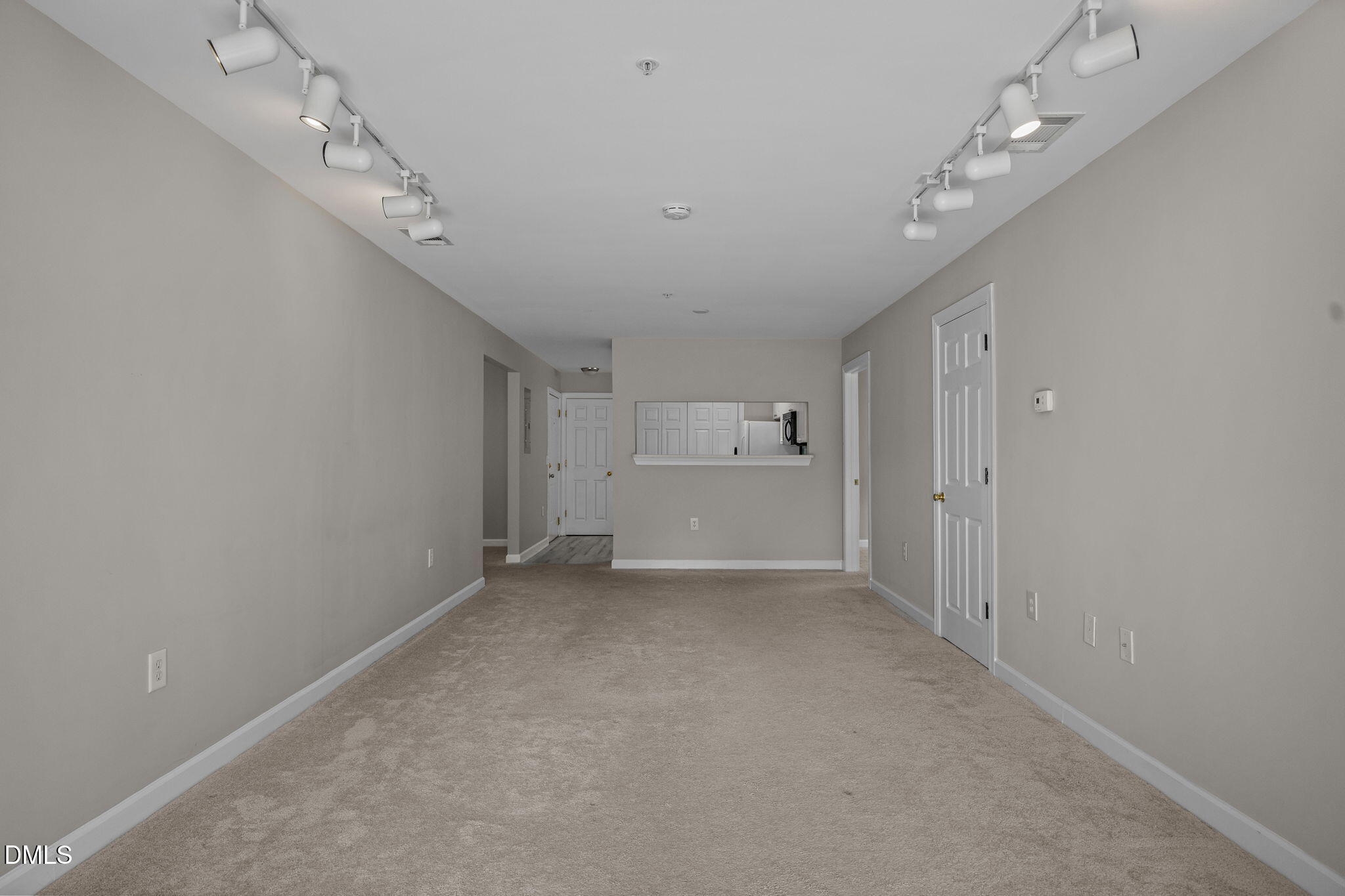 929 Morreene Road, Unit A23 Durham, NC 27705 - Photo 15 of 50 wooden floor in an empty room with a window