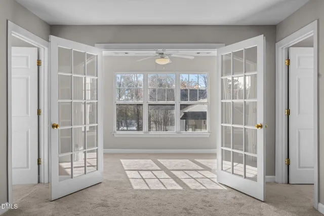 a bathroom with a sink toilet and a mirror