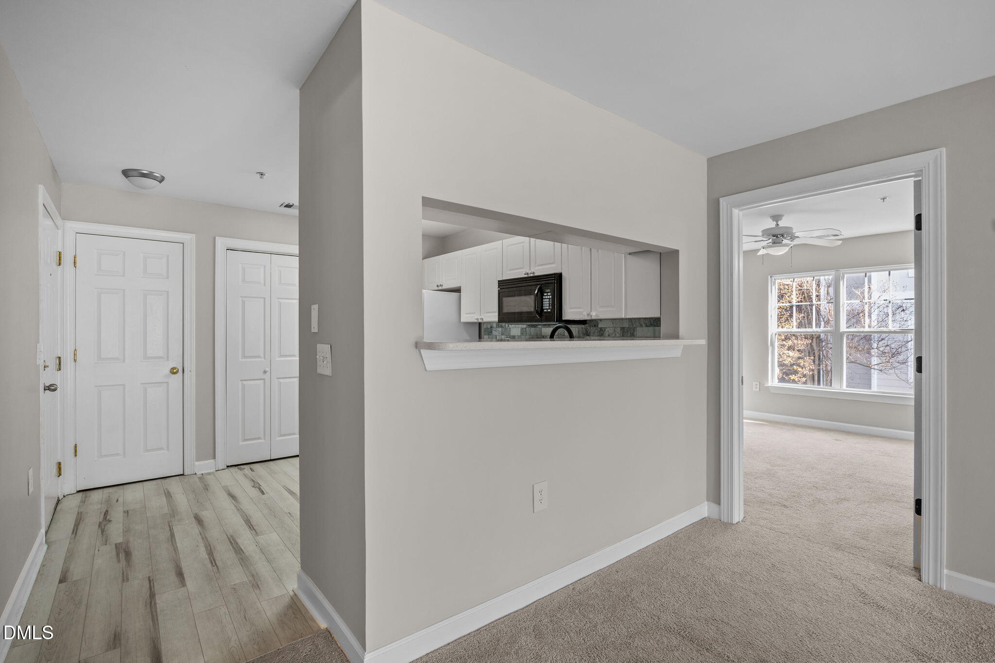 929 Morreene Road, Unit A23 Durham, NC 27705 - Photo 22 of 50 a view of cabinets and wooden floor