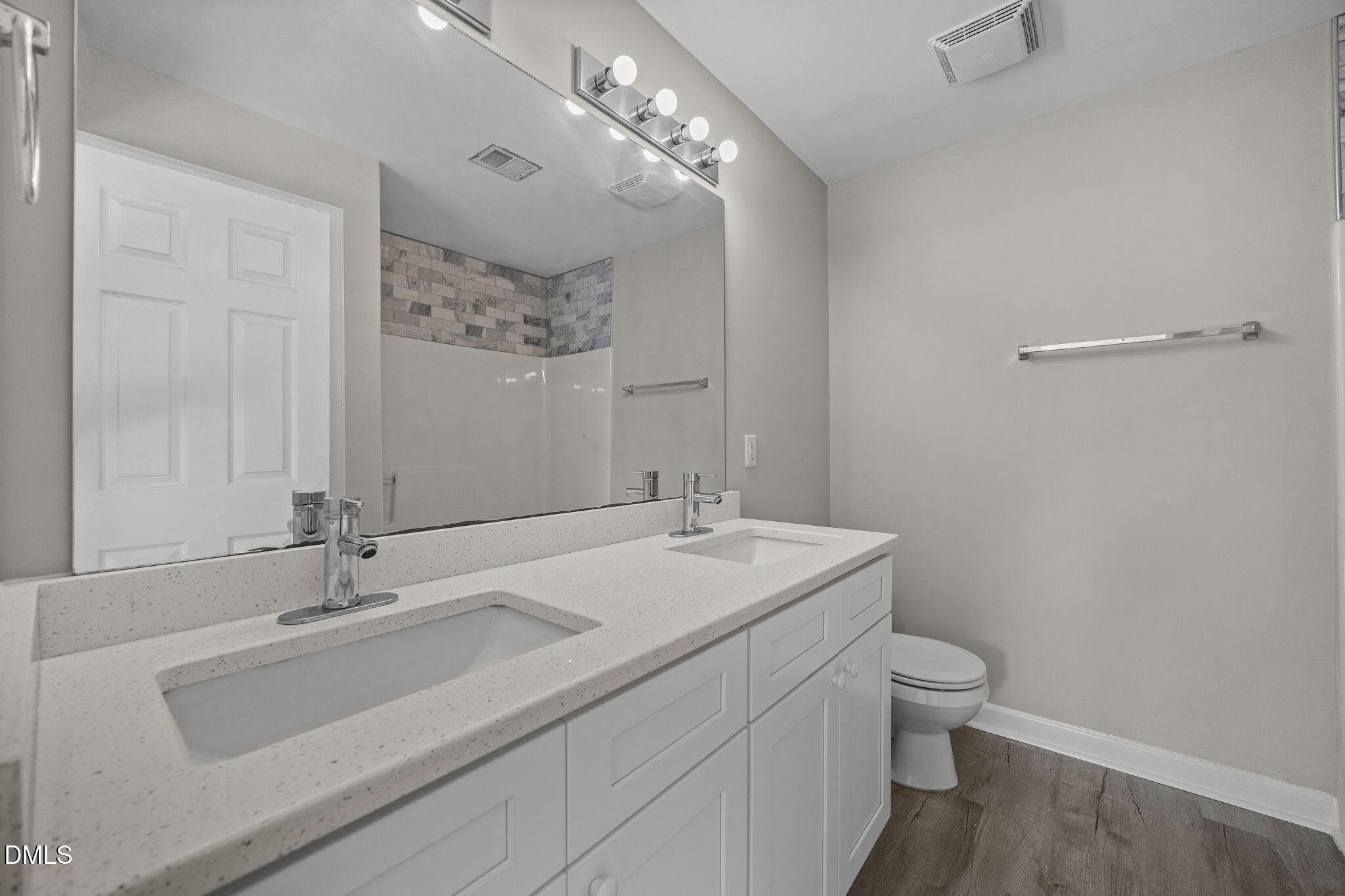 929 Morreene Road, Unit A23 Durham, NC 27705 - Photo 23 of 50 a bathroom with a sink toilet and a mirror