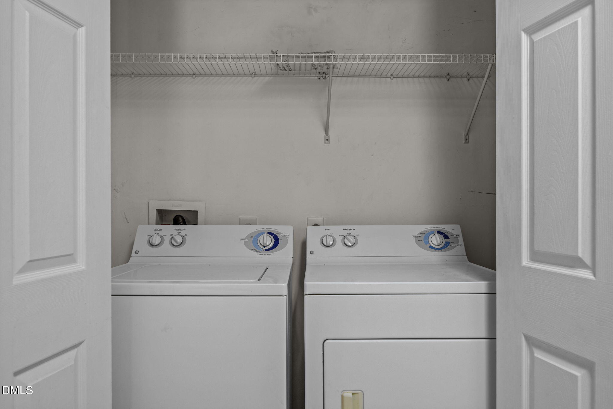 929 Morreene Road, Unit A23 Durham, NC 27705 - Photo 29 of 50 a view of storage and utility room with washer and dryer
