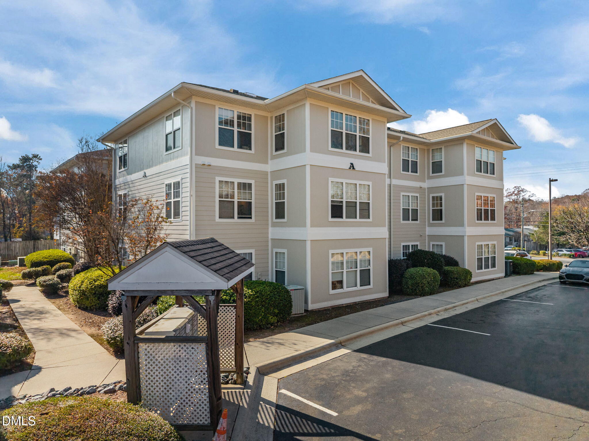929 Morreene Road, Unit A23 Durham, NC 27705 - Photo 3 of 50 a front view of a building with street