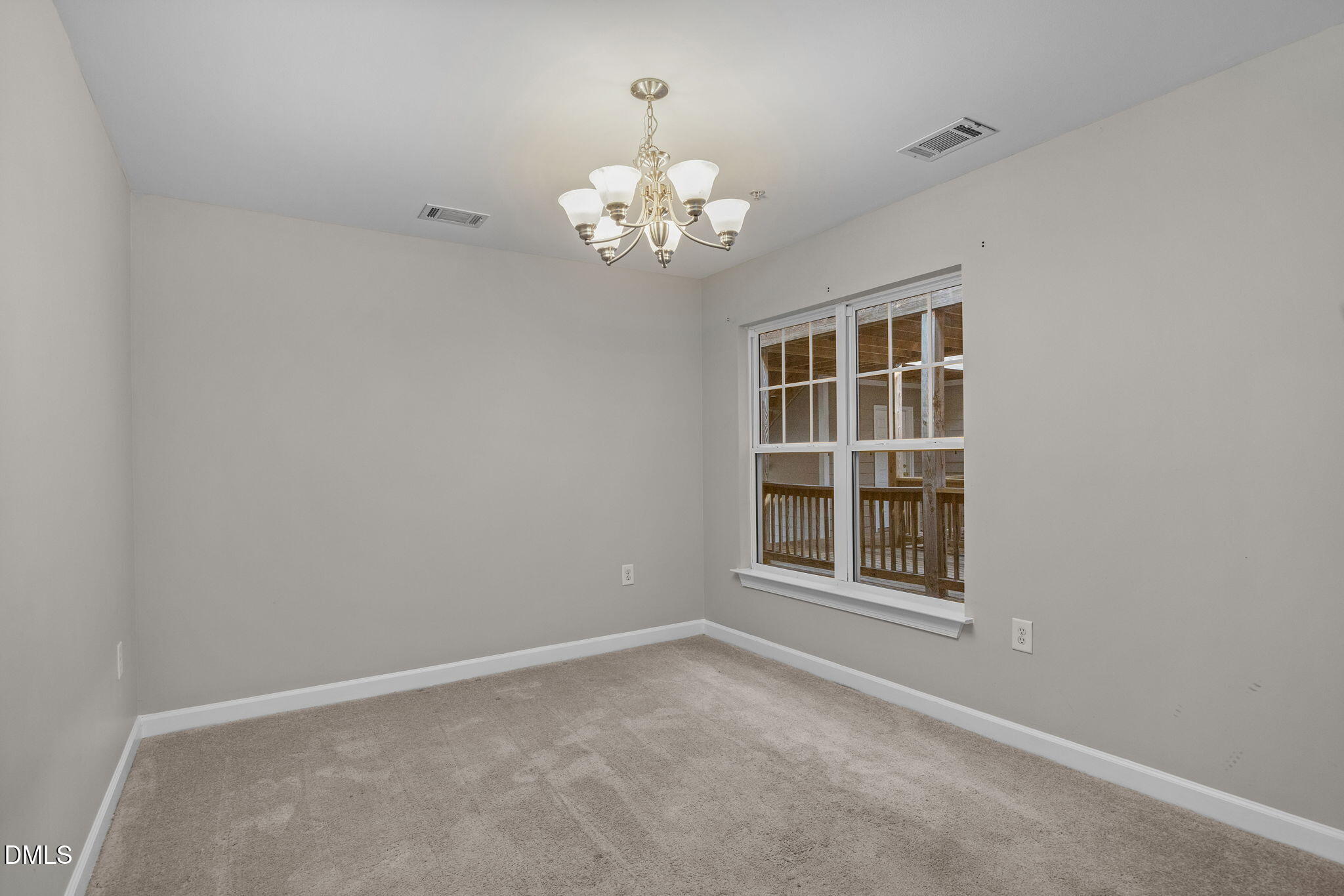 929 Morreene Road, Unit A23 Durham, NC 27705 - Photo 6 of 50 an empty room with a window