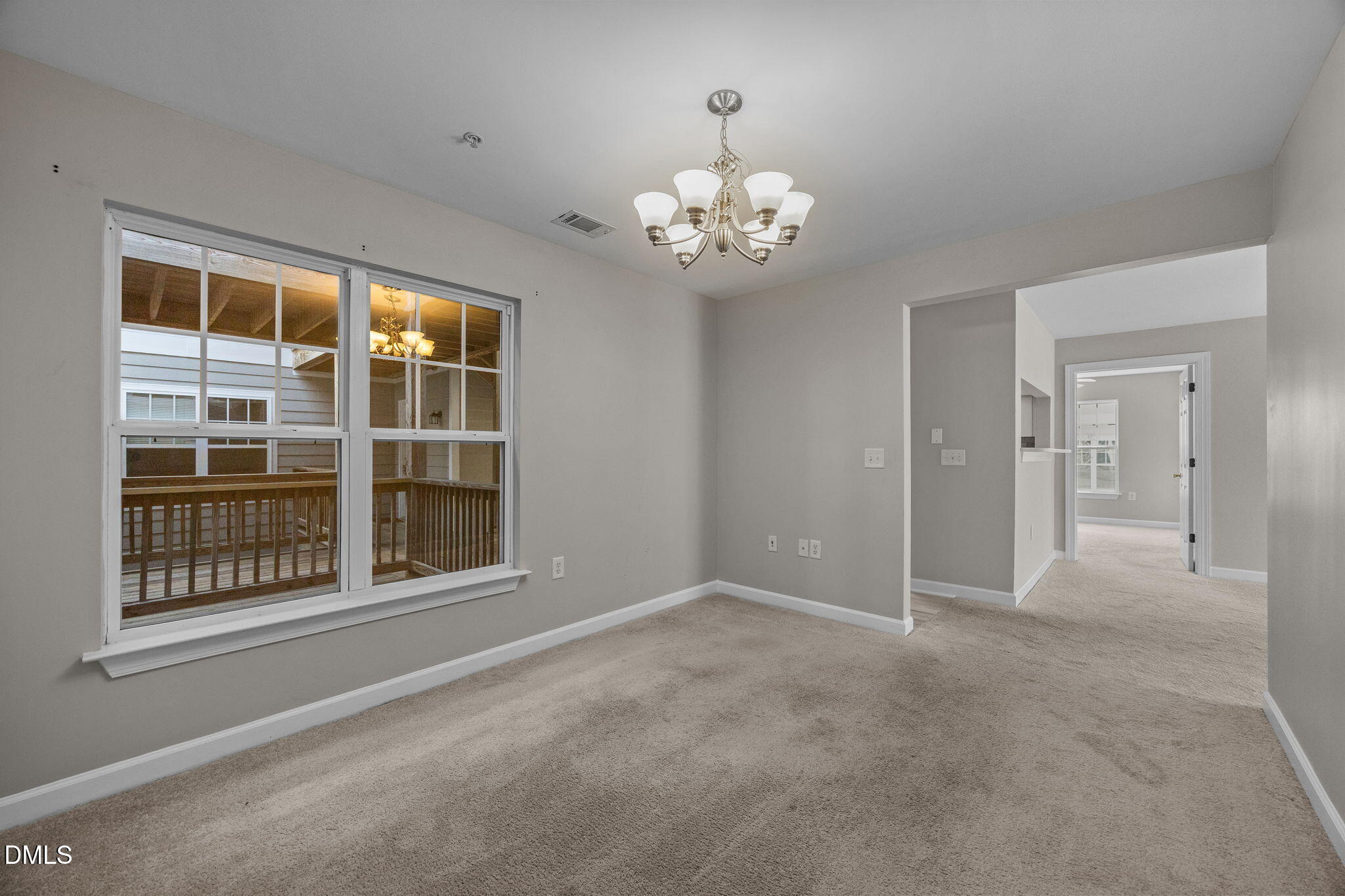 929 Morreene Road, Unit A23 Durham, NC 27705 - Photo 7 of 50 a view of an empty room with a window