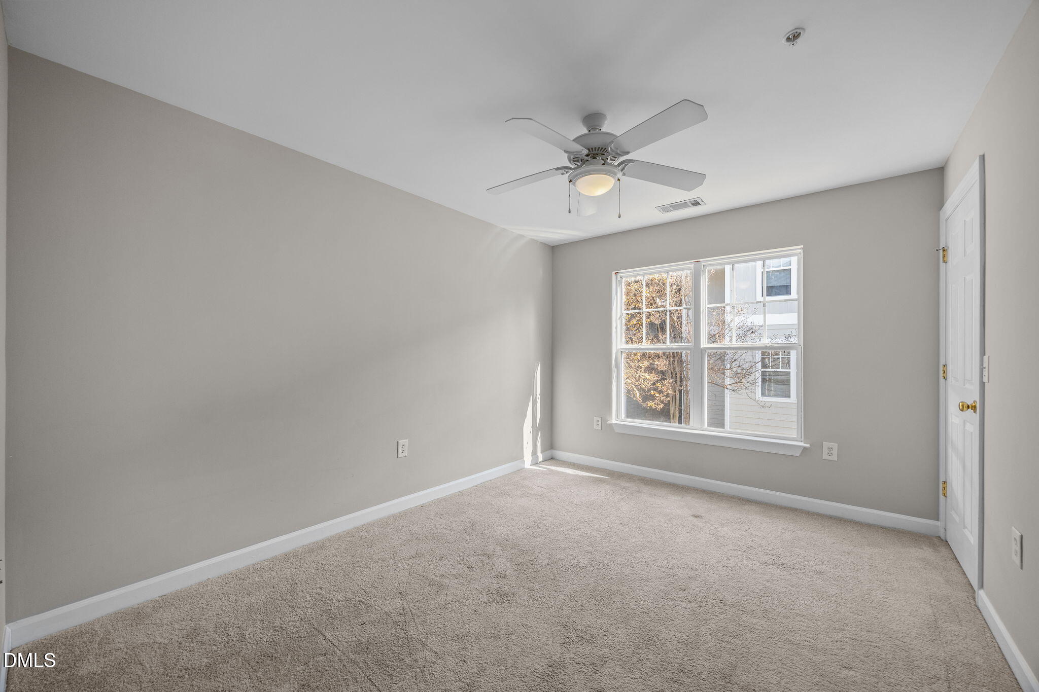 929 Morreene Road, Unit A23 Durham, NC 27705 - Photo 8 of 50 a view of an empty room with a window