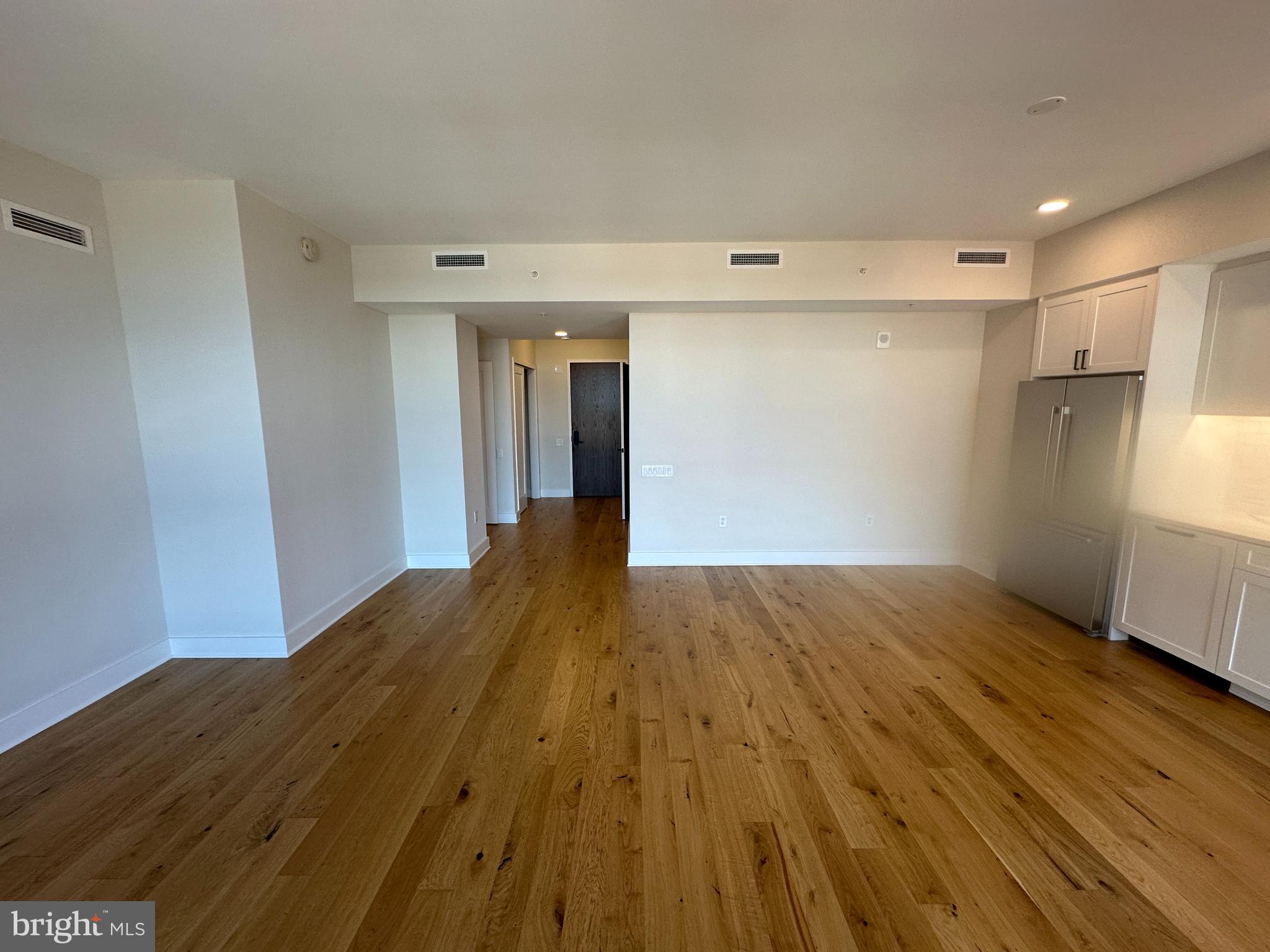 1211 Van Street Southeast, Unit 1201 Washington, DC 20003 - Photo 11 of 58 a view of hallway with wooden floor
