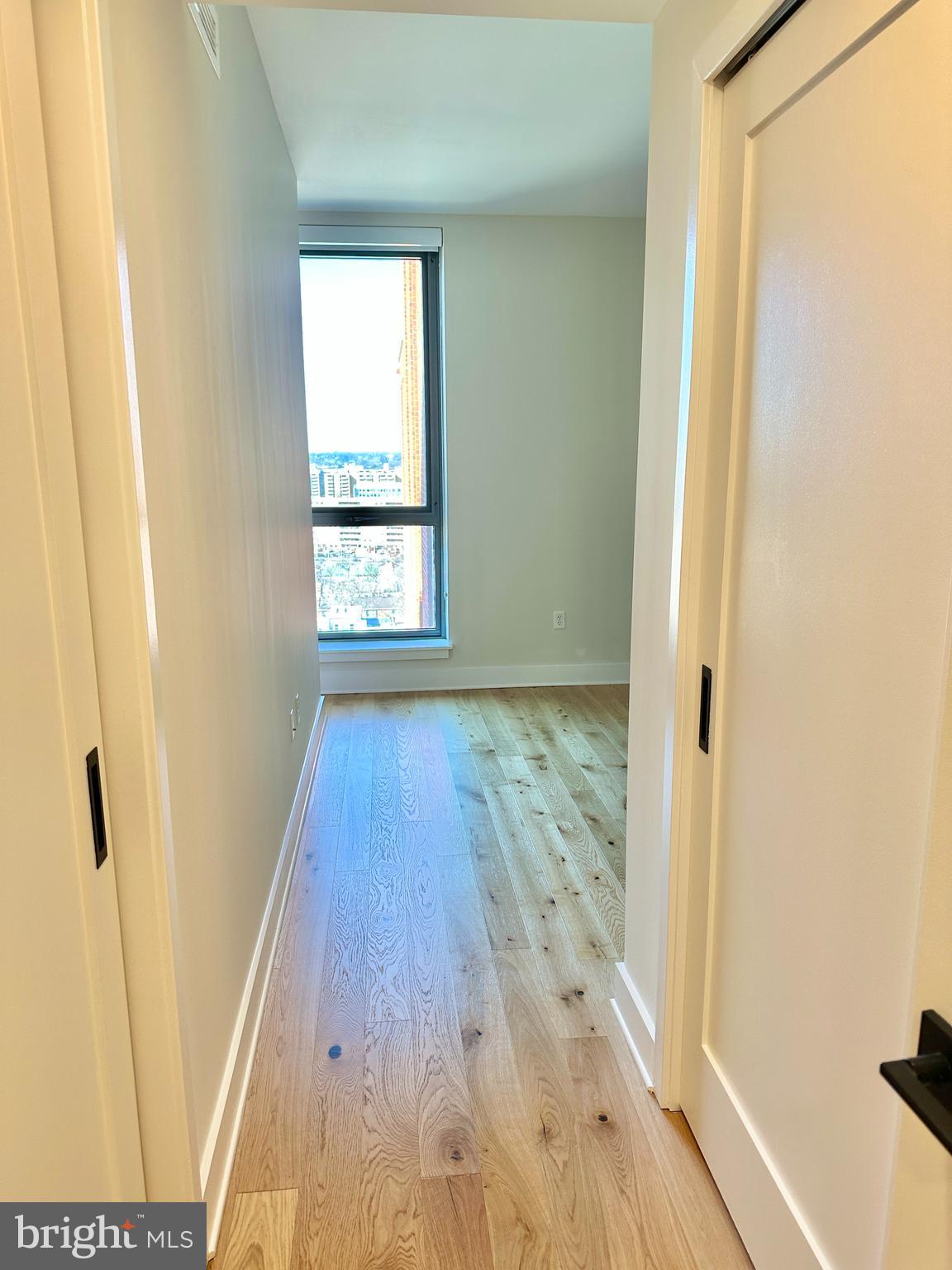1211 Van Street Southeast, Unit 1201 Washington, DC 20003 - Photo 18 of 58 a view of wooden floor in a room