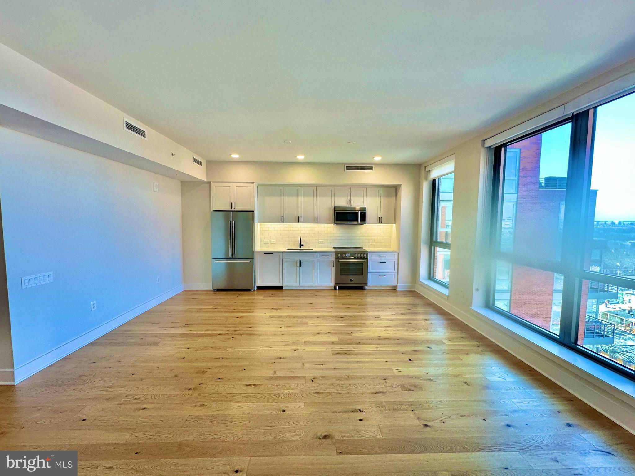1211 Van Street Southeast, Unit 1201 Washington, DC 20003 - Photo 3 of 58 a view of kitchen with furniture and window