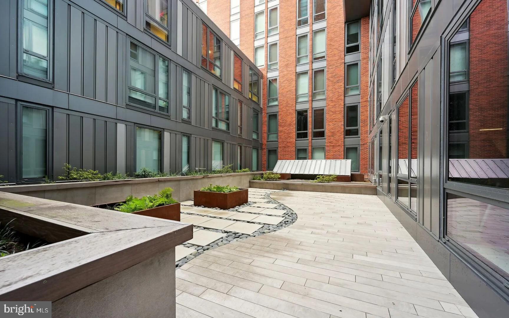 1211 Van Street Southeast, Unit 1201 Washington, DC 20003 - Photo 44 of 58 a view of a building with brick walls