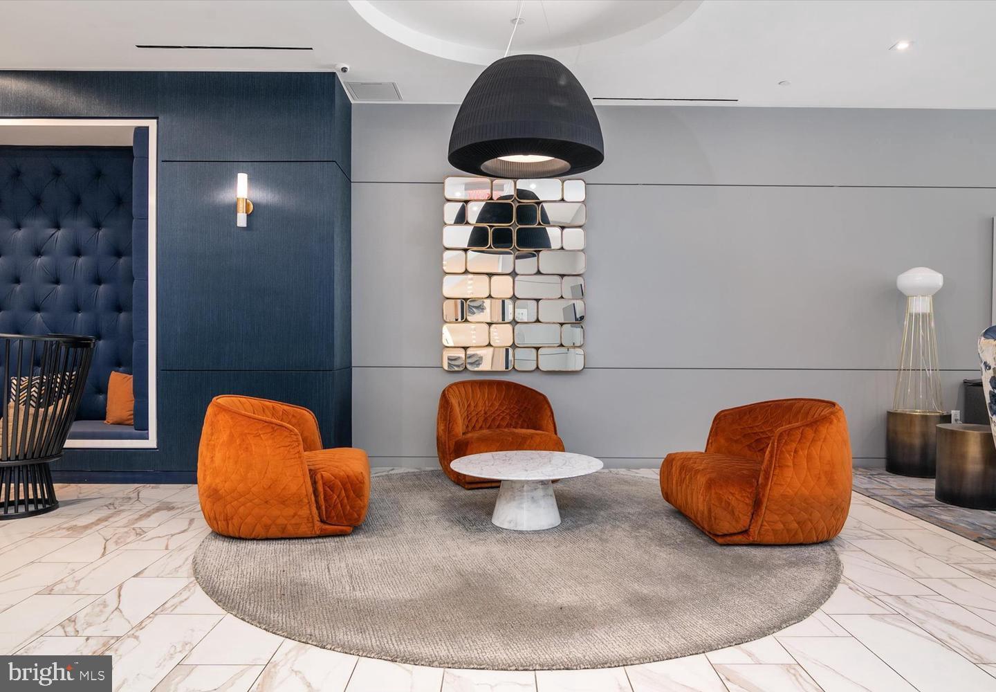 1211 Van Street Southeast, Unit 1201 Washington, DC 20003 - Photo 55 of 58 a room with furniture and a lamp