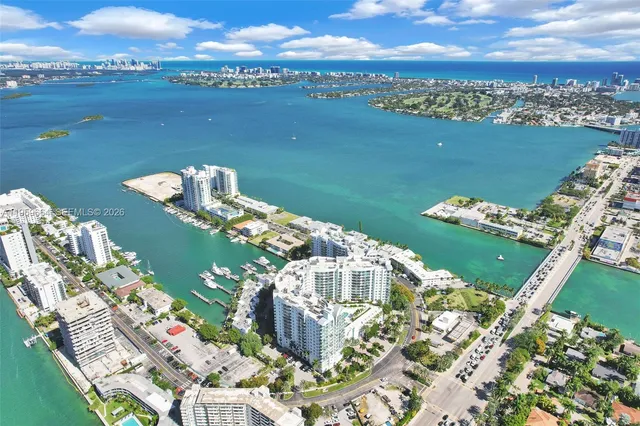 a view of a balcony with wooden floor
