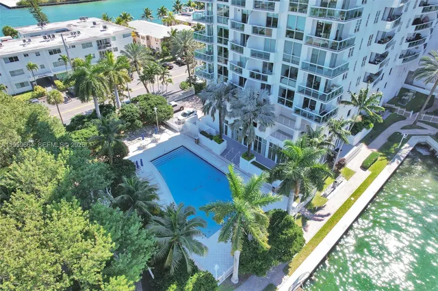 a room with furniture or couch and a large window