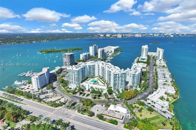 a bedroom with a bed and a table