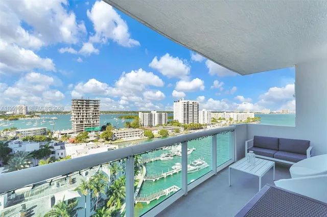 a kitchen with stainless steel appliances a stove top oven and a refrigerator