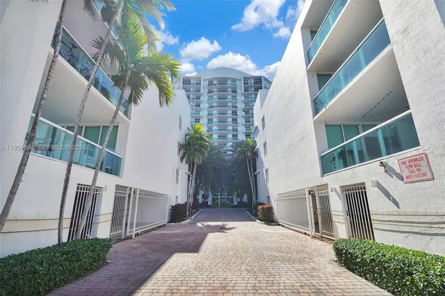 a view of a city with an ocean