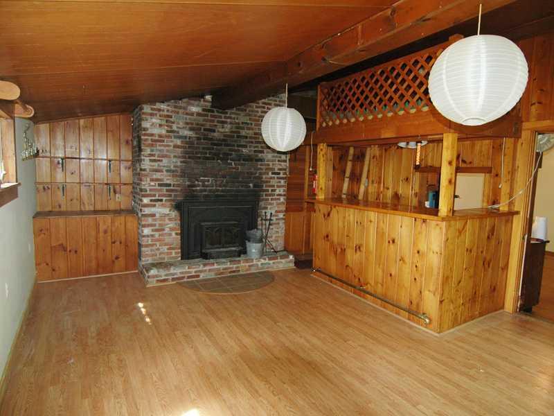 373 Oyster River Road Warren, ME 04864 - Photo 7 of 17 Den/Family/Great Room. The fireplace...