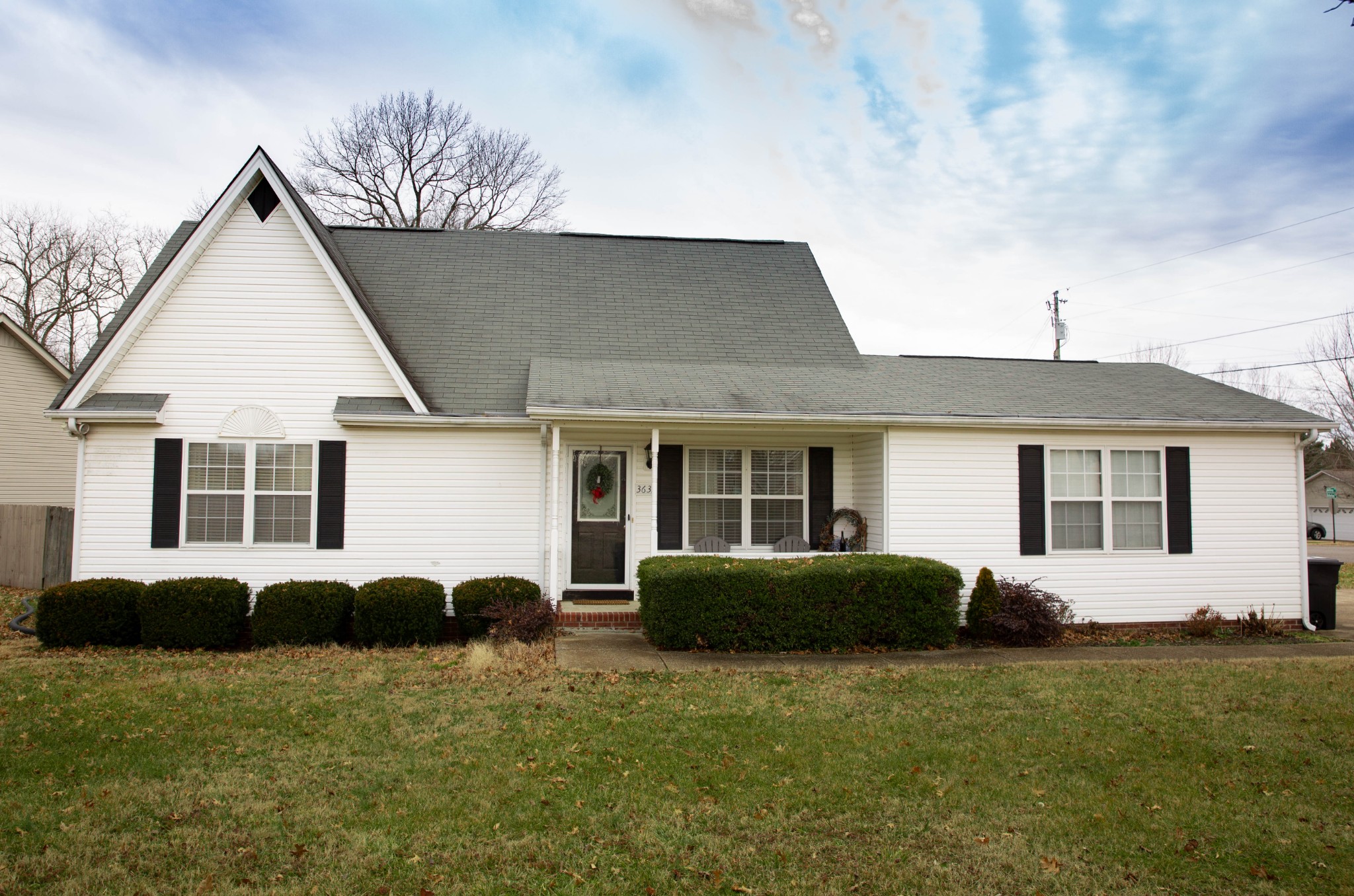 3633 Rutherford Drive Spring Hill, TN 37174 - Photo 1 of 26 a front view of a house with a garden