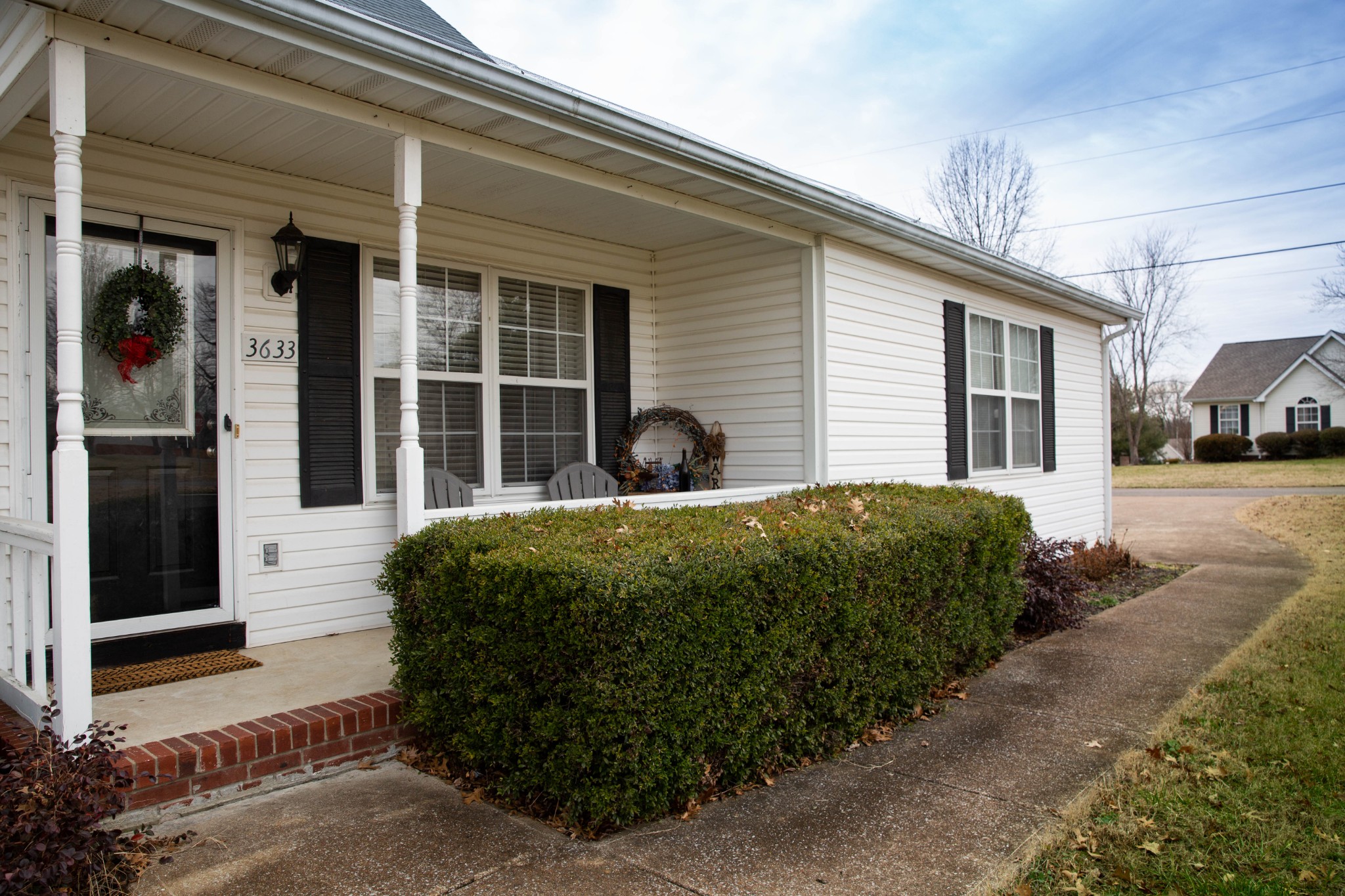 3633 Rutherford Drive Spring Hill, TN 37174 - Photo 2 of 26 a view of a house with a garden