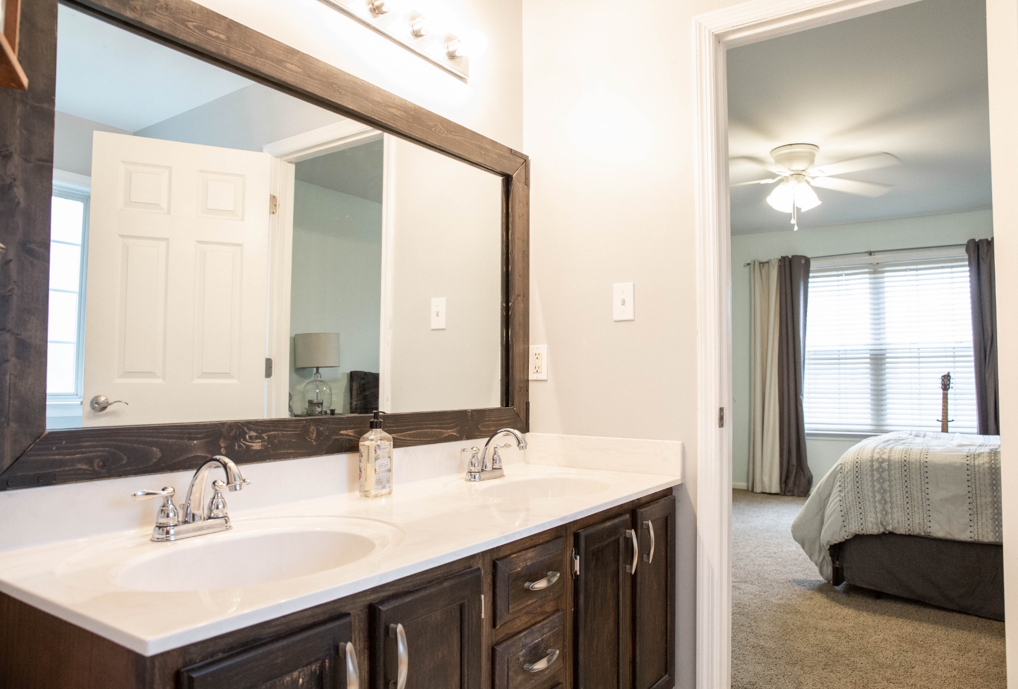 3633 Rutherford Drive Spring Hill, TN 37174 - Photo 13 of 26 a bathroom with a sink double vanity and a mirror