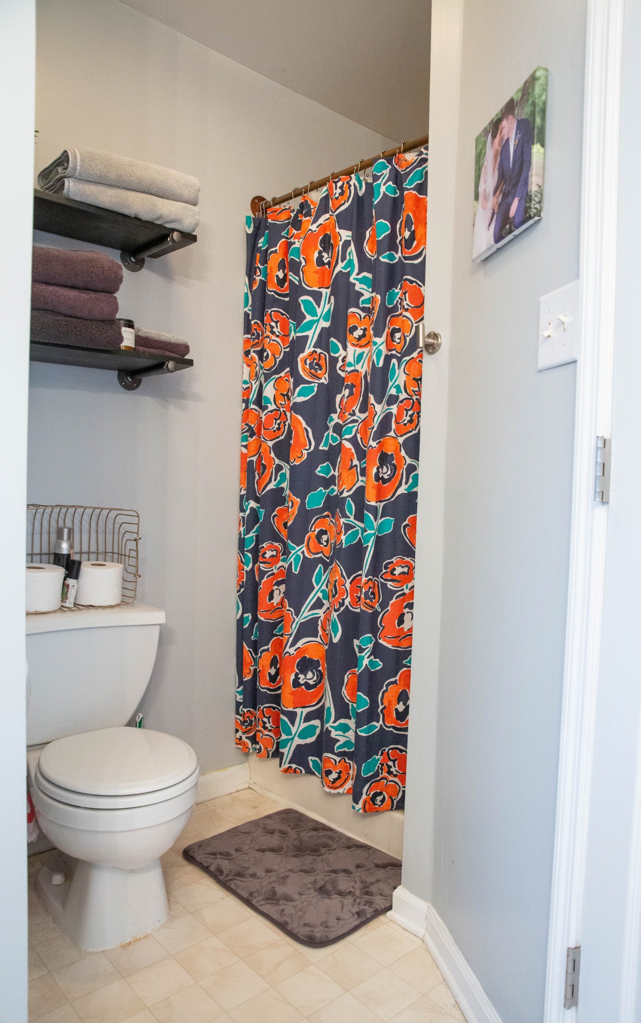 3633 Rutherford Drive Spring Hill, TN 37174 - Photo 16 of 26 a bathroom with a toilet and a shower curtain