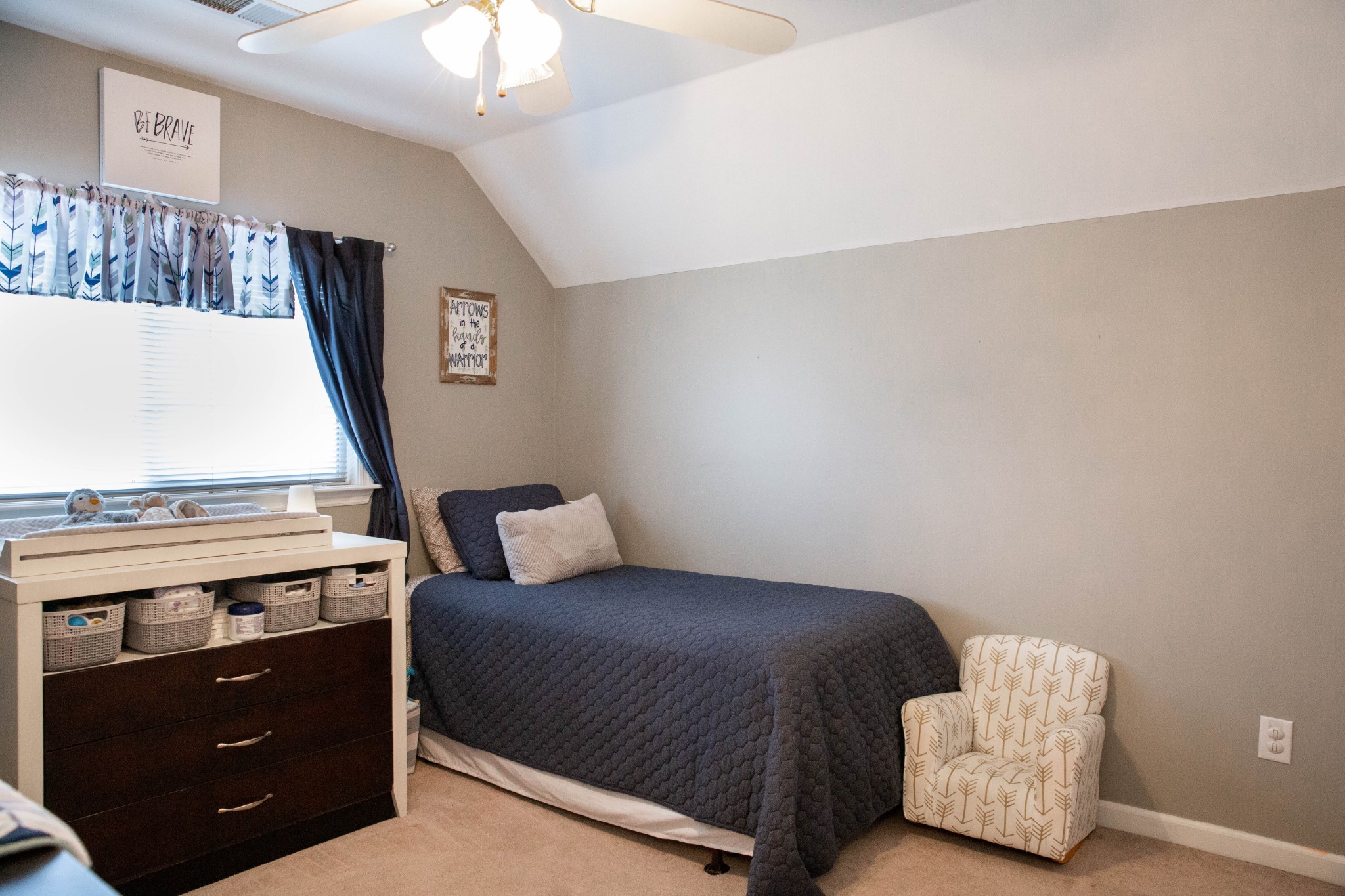 3633 Rutherford Drive Spring Hill, TN 37174 - Photo 19 of 26 a bedroom with a bed and a couch