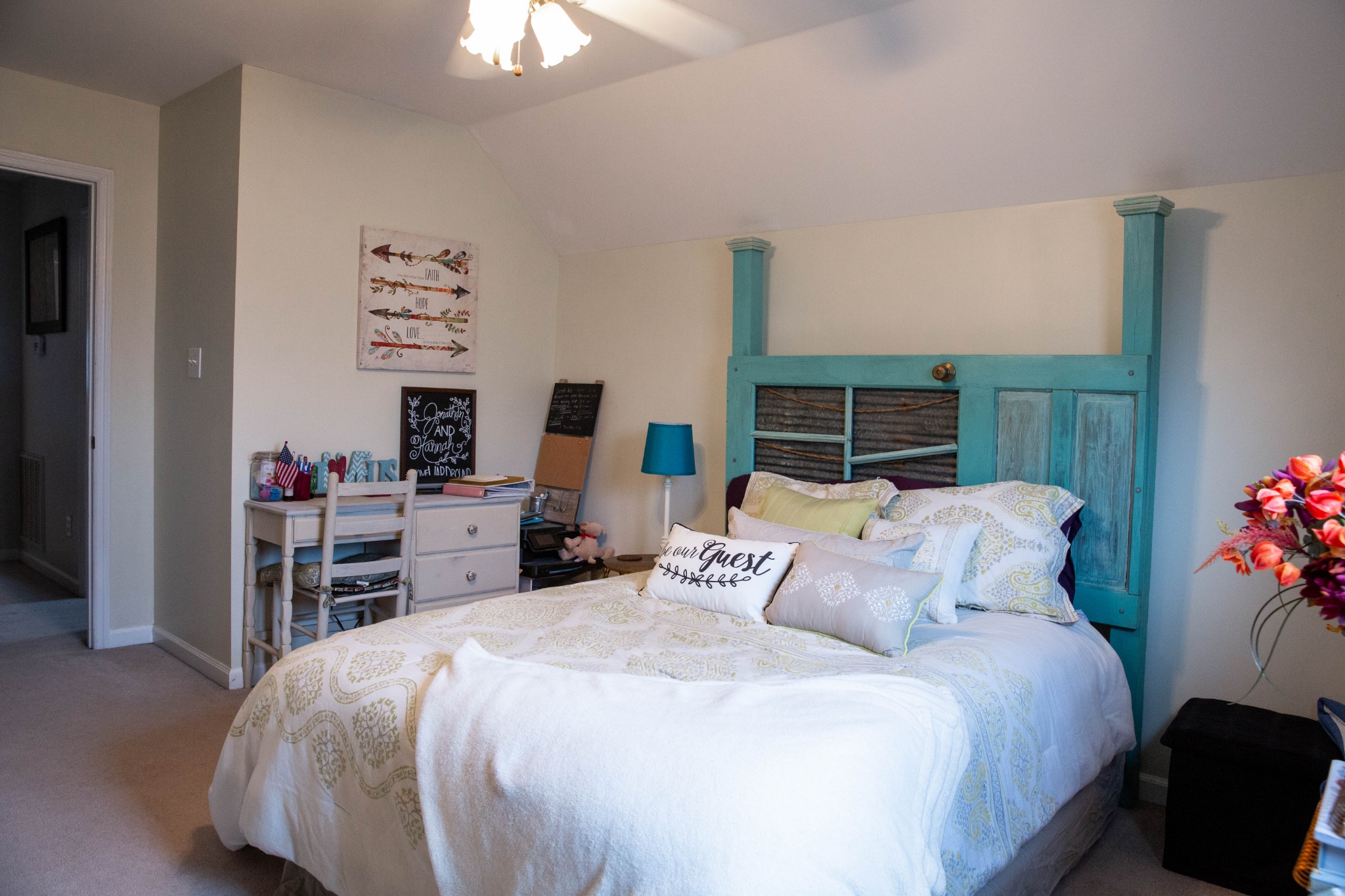 3633 Rutherford Drive Spring Hill, TN 37174 - Photo 21 of 26 a bedroom with a bed and a chandelier