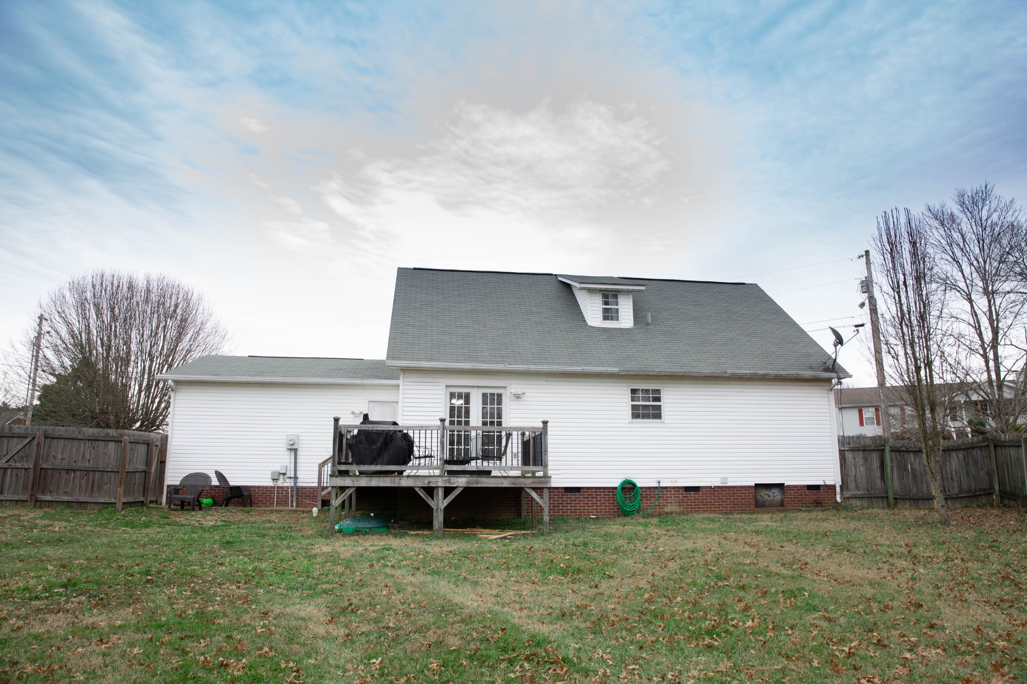3633 Rutherford Drive Spring Hill, TN 37174 - Photo 25 of 26 a backyard of a house with table and chairs