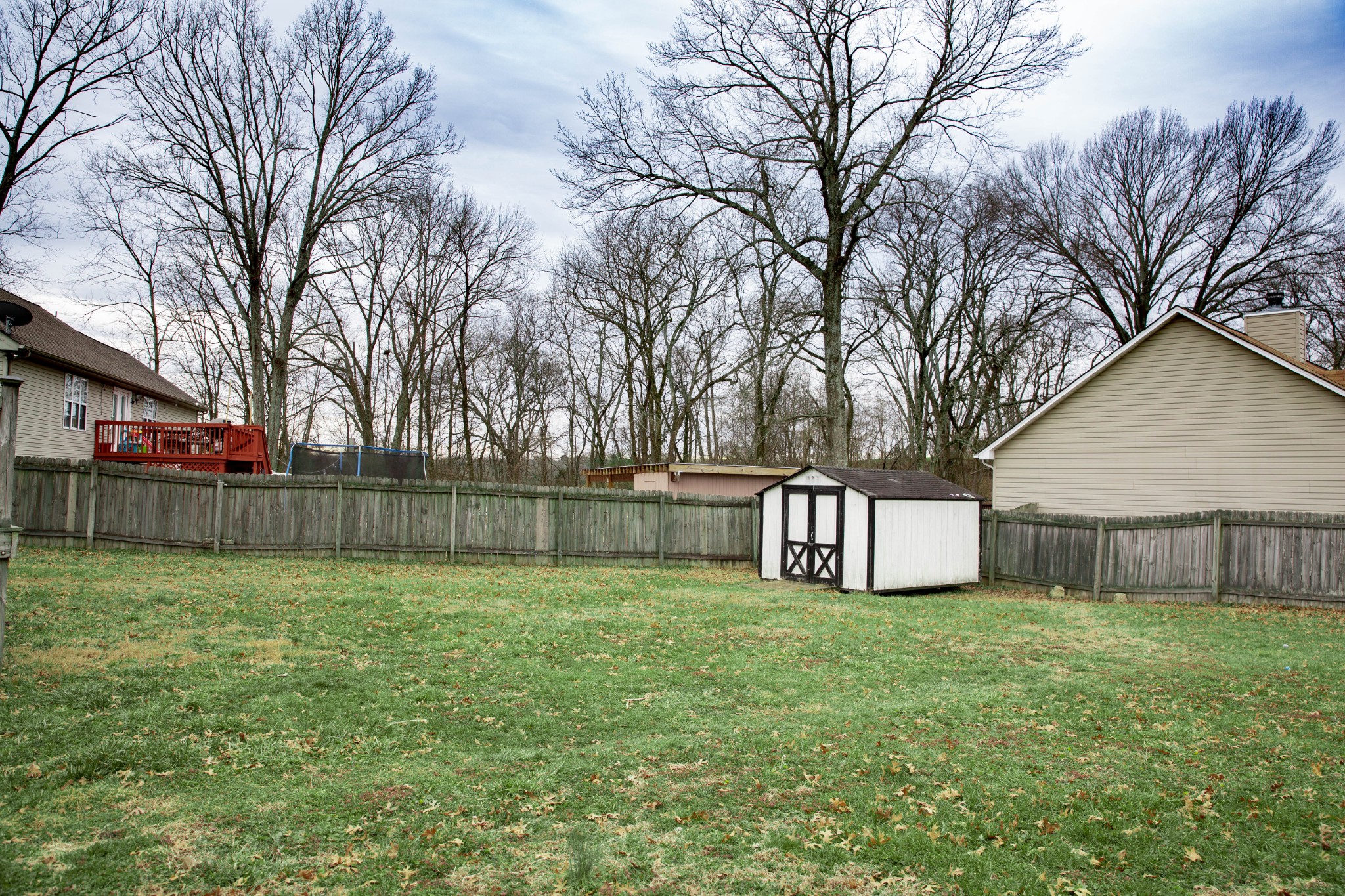 3633 Rutherford Drive Spring Hill, TN 37174 - Photo 26 of 26 a view of a house with a yard and fence