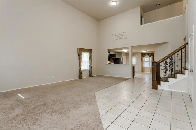 a view of a hallway with windows