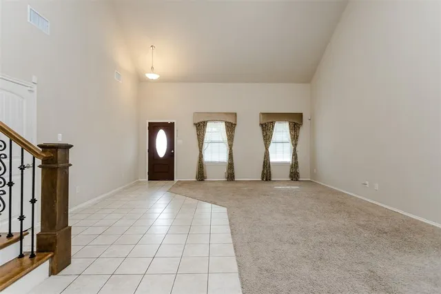 a kitchen with stainless steel appliances granite countertop a stove microwave and sink