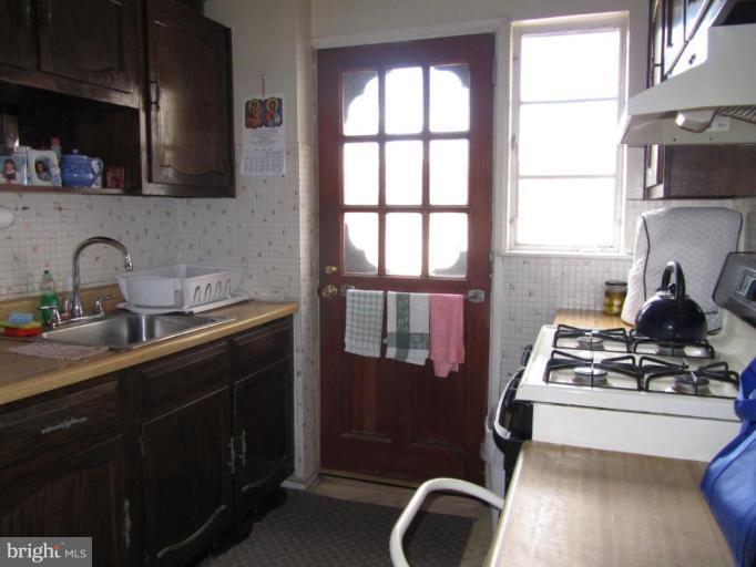 12020 Claridge Road Silver Spring, MD 20902 - Photo 14 of 14 Kitchen with Gas Cooking & Door to Backyard