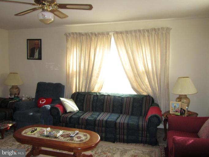 12020 Claridge Road Silver Spring, MD 20902 - Photo 4 of 14 Large Living Room with Ceiling Fan