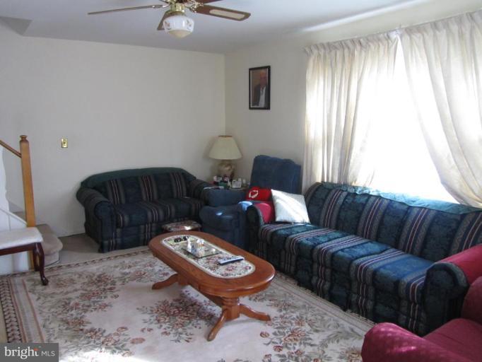 12020 Claridge Road Silver Spring, MD 20902 - Photo 5 of 14 Large Living Room with Ceiling Fan