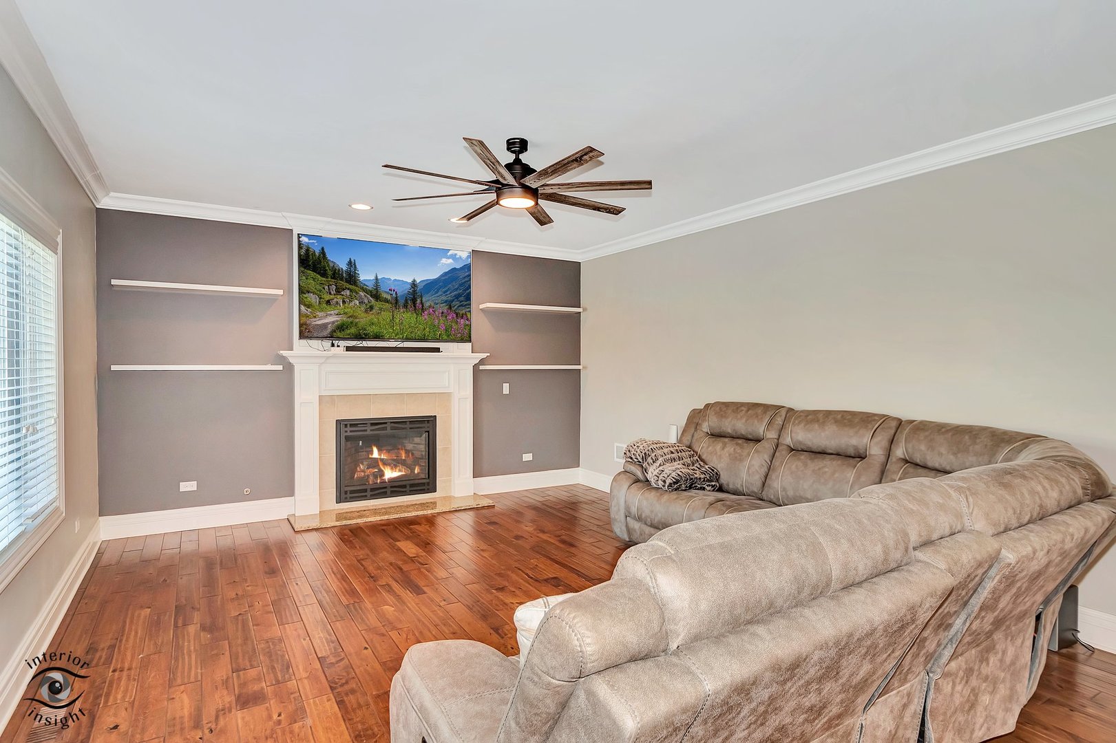 13754 Memorial Drive Manhattan, IL 60442 - Photo 12 of 37 a bedroom with a bed and a fireplace